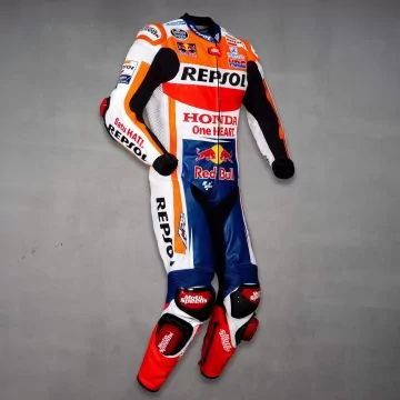 Repsol Honda replica race suit in red, blue and white, right side view